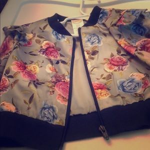 Childrens light floral jacket.